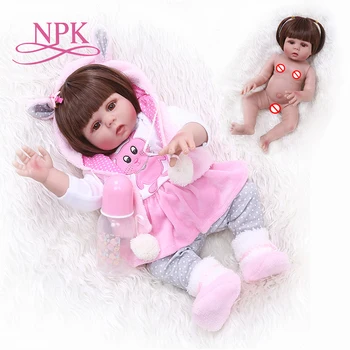 Envío gratis a partir de Brasil NPK 48 CM bebe reborn toddler girl doll en color rosa conejo vestido lleno de silicona cuerpo Anatómicamente Correcta